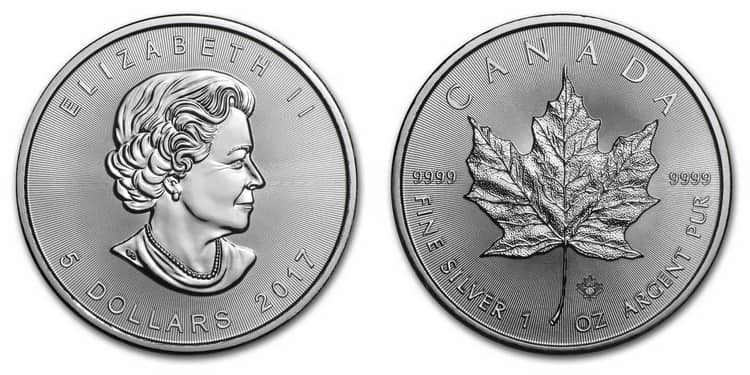 Серебряная монета с клевером